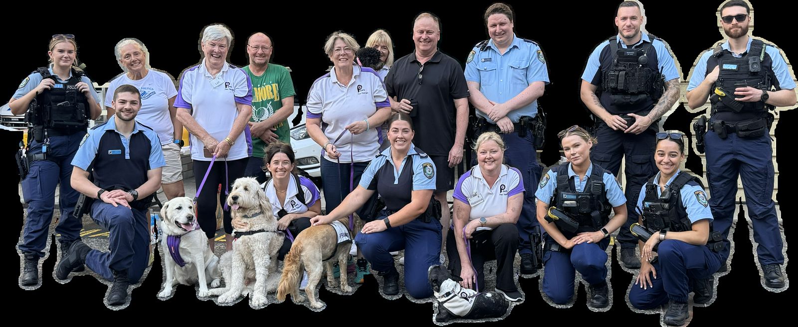 PAWS volunteers and their therapy dogs with NSW Police officers, visiting to offer support after Bondi