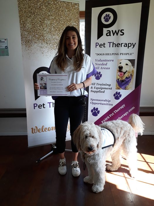 Cat and Fisher, a PAWS volunteer team