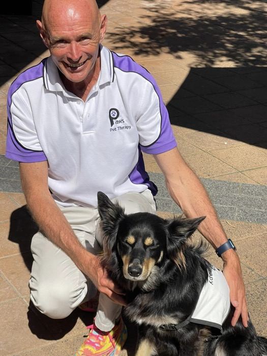 John, Michael and Madeline, a PAWS volunteer team