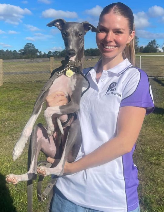 Katelyn and Carlitos, a PAWS volunteer team
