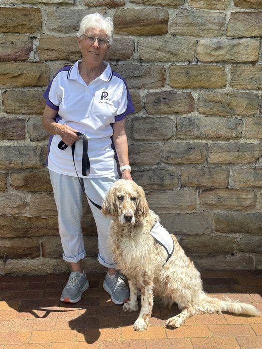 Liz Moses and Red, a PAWS volunteer team